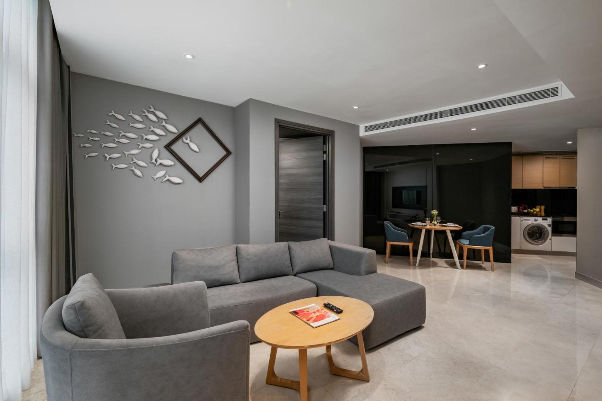 Fraser Place Puteri Harbour Nusajaya  Εξωτερικό φωτογραφία A living room in a serviced apartment in Singapore